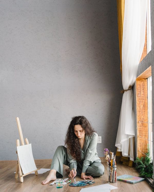 Woman feeling energetic and vital in a bright, open space.